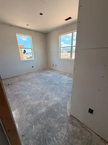Drywall interior walls with two windows