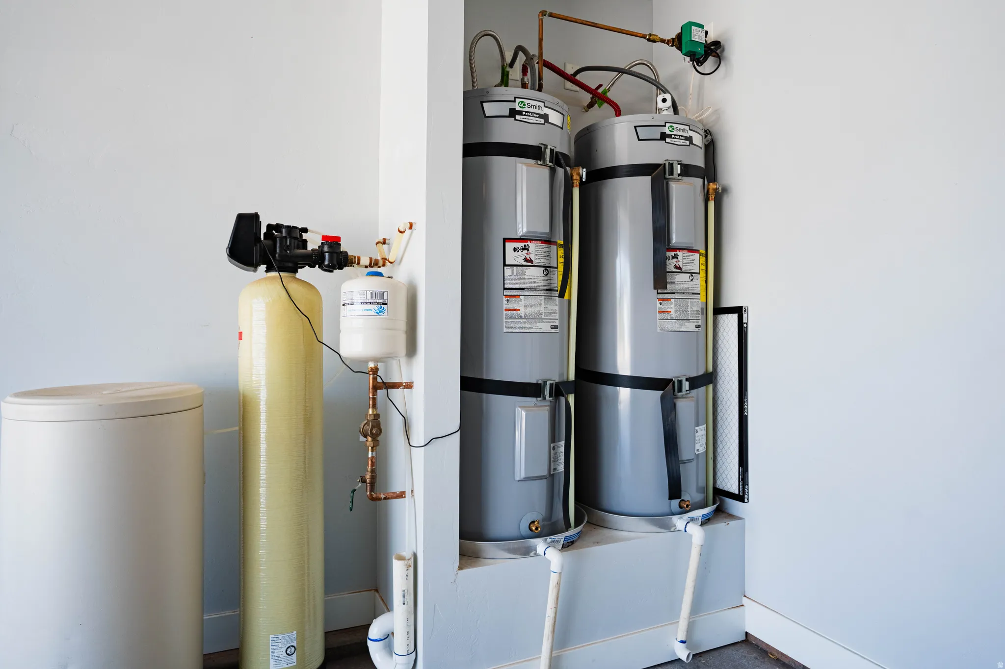 Dual water heaters with a water softener system