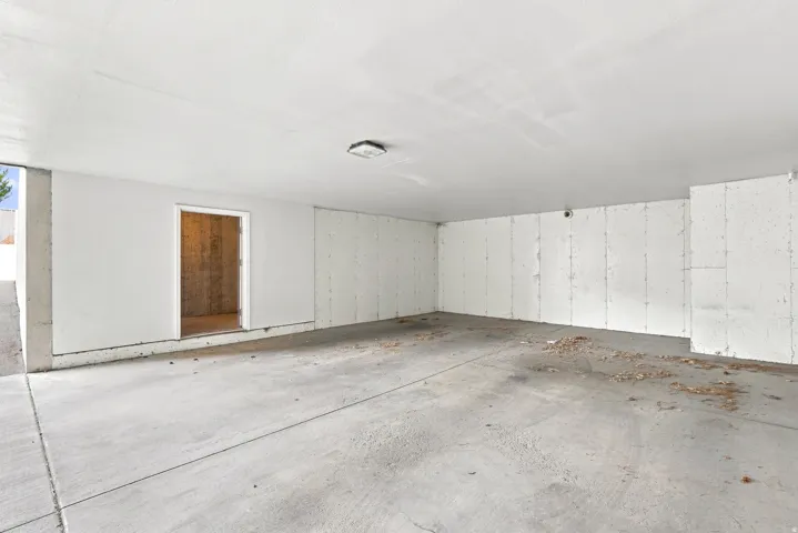 Concrete flooring with an integrated overhead light fixture
