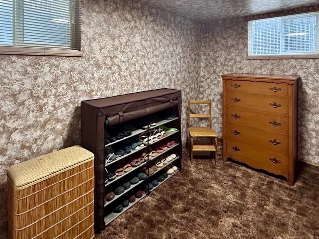 Second basement bedroom with double windows that has access either through the bathroom or other bedroom