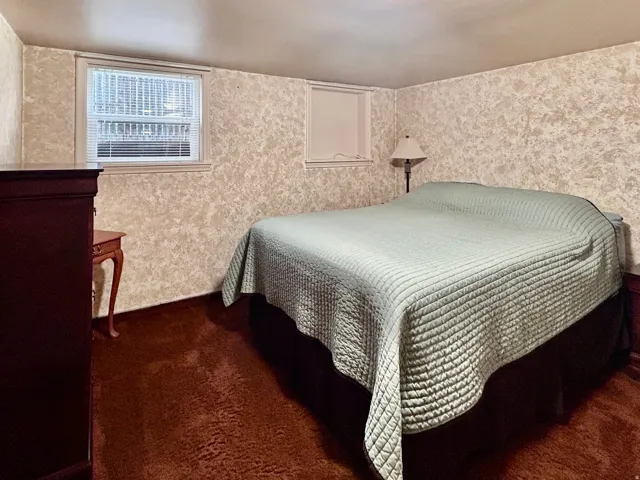 Large double windows in the basement bedroom