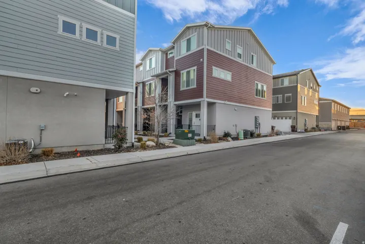 Multi-story exterior with a combination of horizontal siding and board and batten
