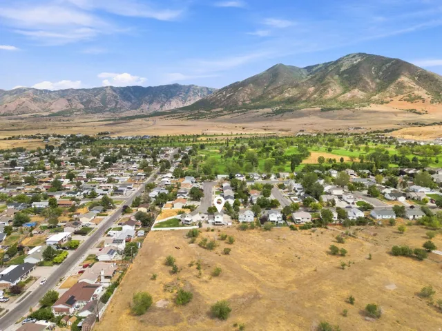 Expansive property with mountain backdrop