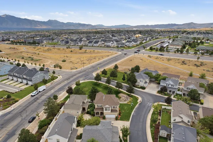 Residential community with mountain backdrop, established streets, and varied architectural styles