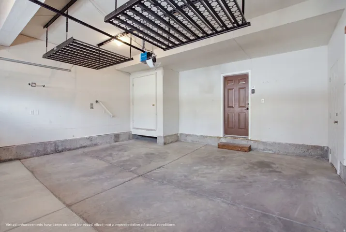 Concrete flooring garage with an overhead storage system