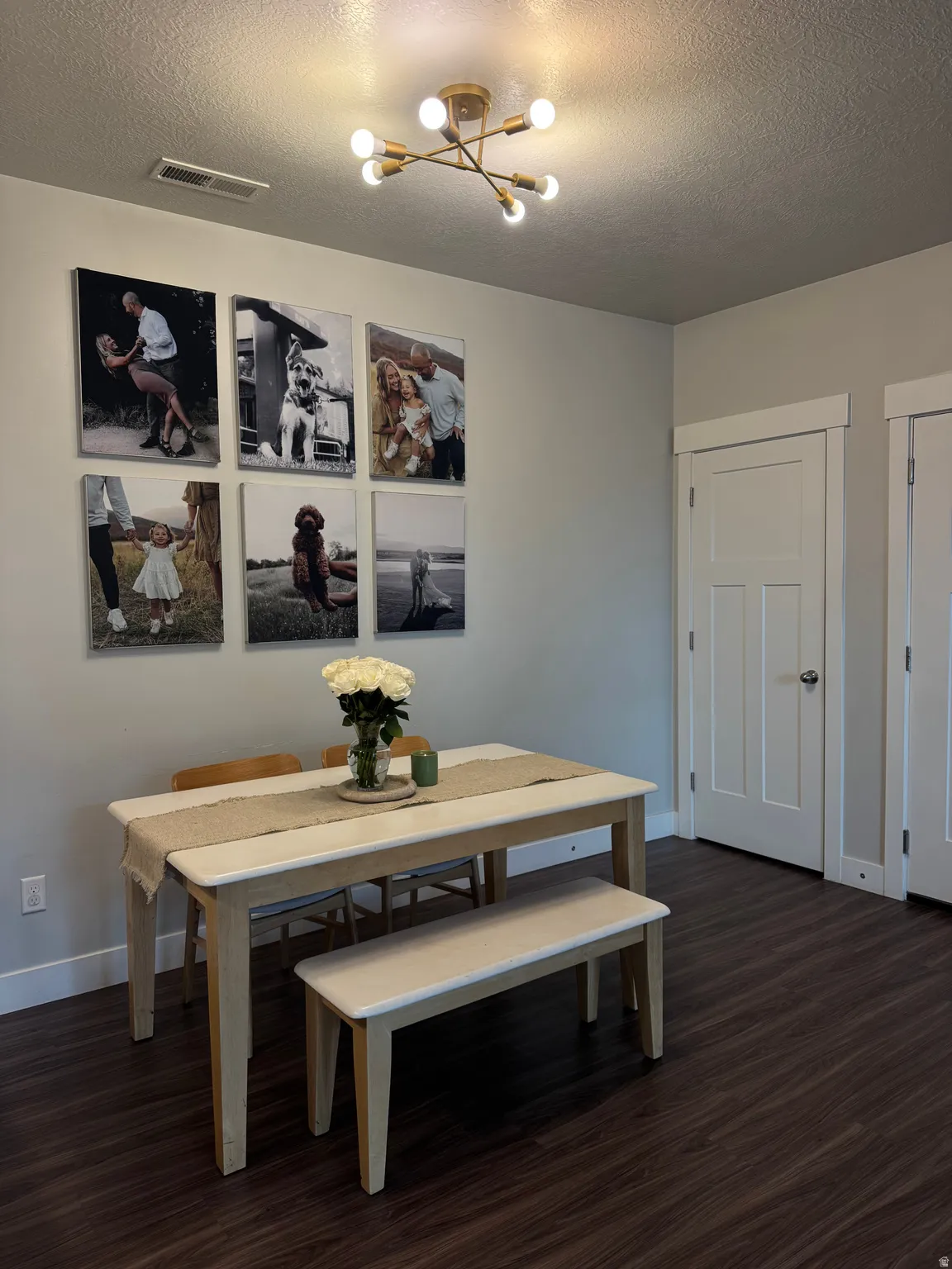 Dark wood-finish flooring with light wall paint