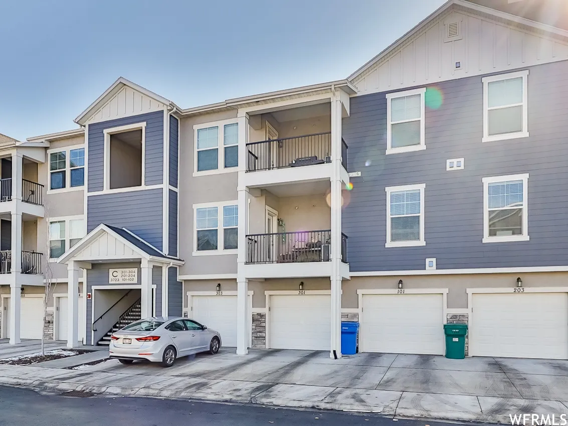 Multi-story residential building with private balconies