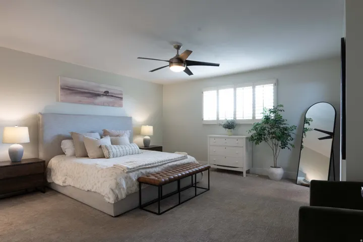 Recessed lighting, ceiling fan with integrated lighting, window with plantation shutters, wall-to-wall carpeting, and neutral wall tones
