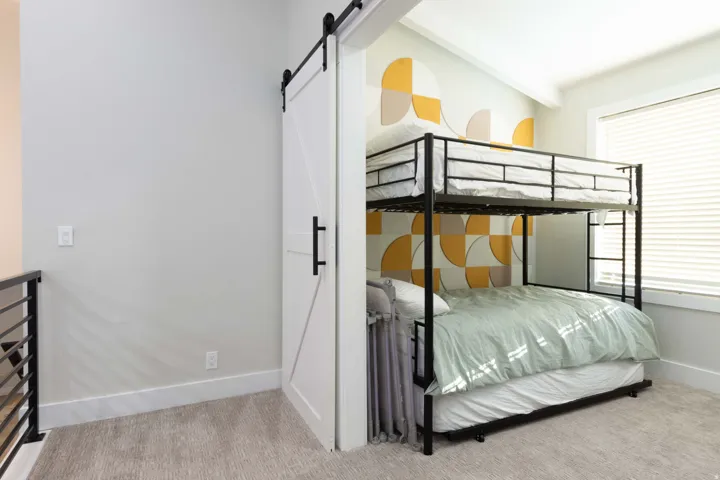 White barn door with black hardware