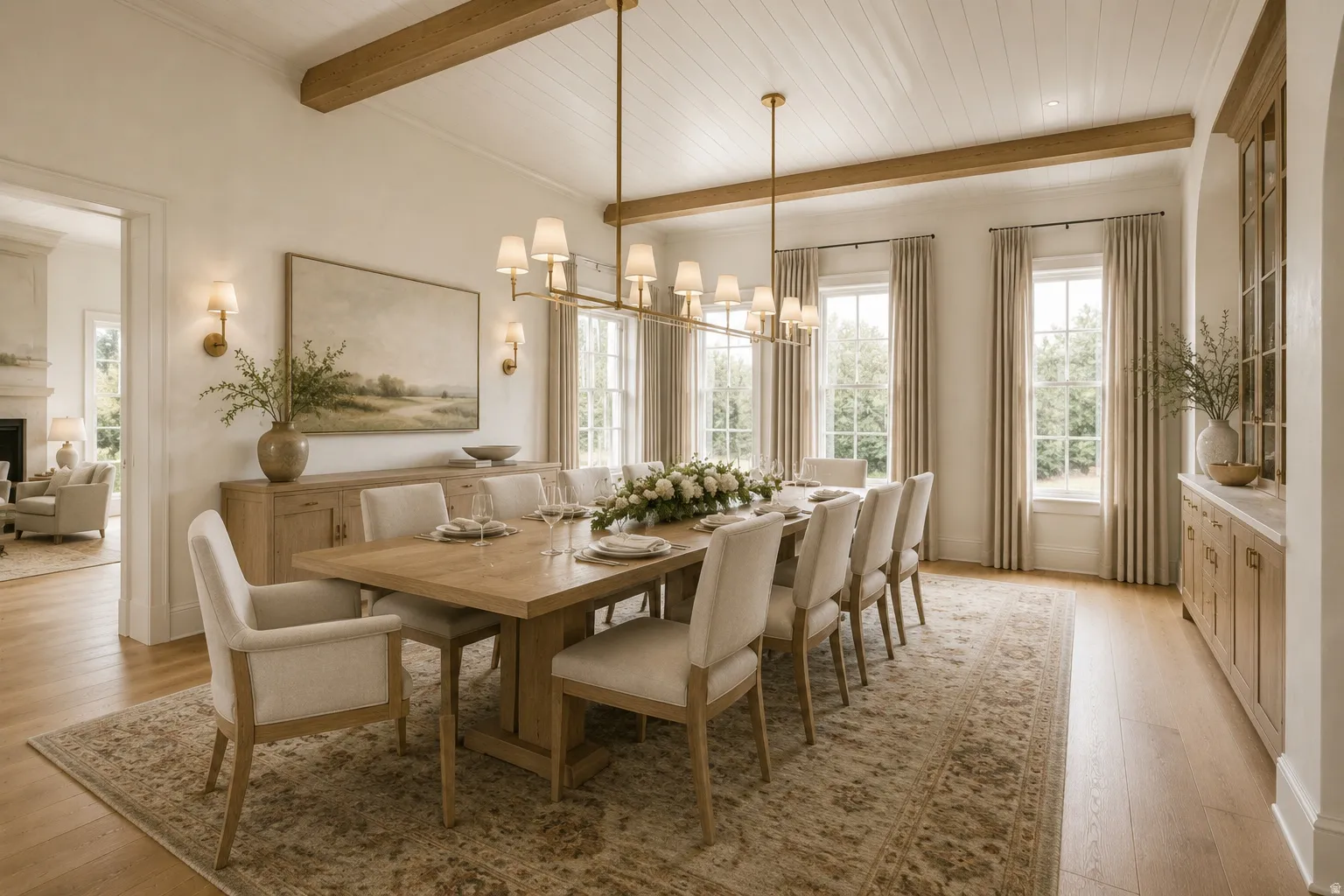 Wood-finish flooring, exposed ceiling beams, built-in cabinetry, elegant chandelier, and wall sconces
