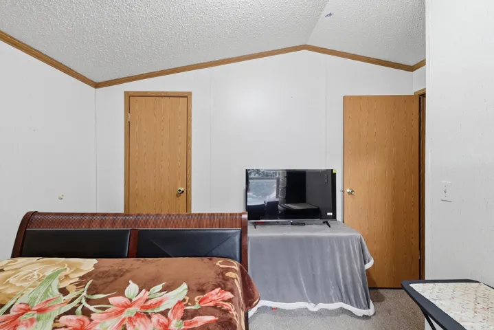 White paneled walls with wood-finish trim