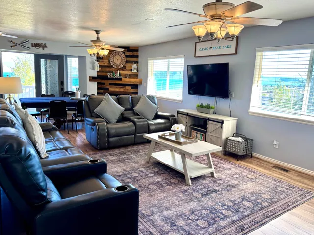 Wood-finish flooring throughout, complemented by light-colored walls