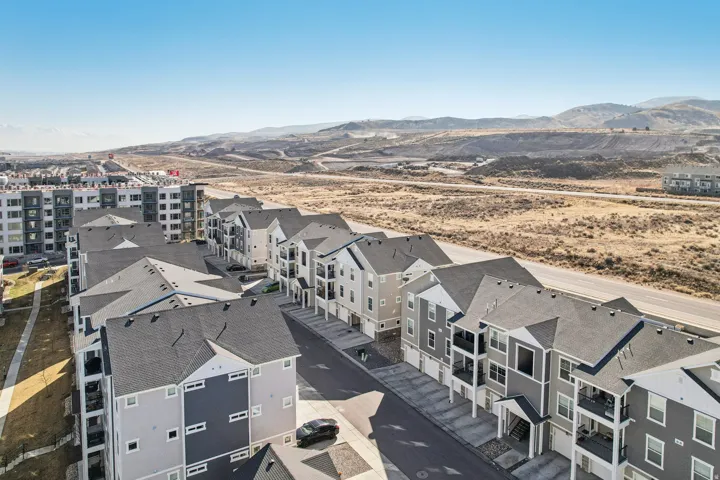 Modern multi-story buildings with varied exterior finishes