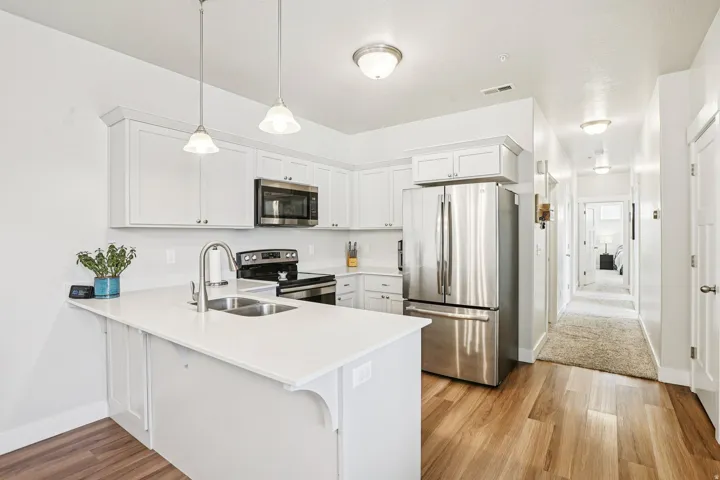 White cabinetry with brushed nickel hardware