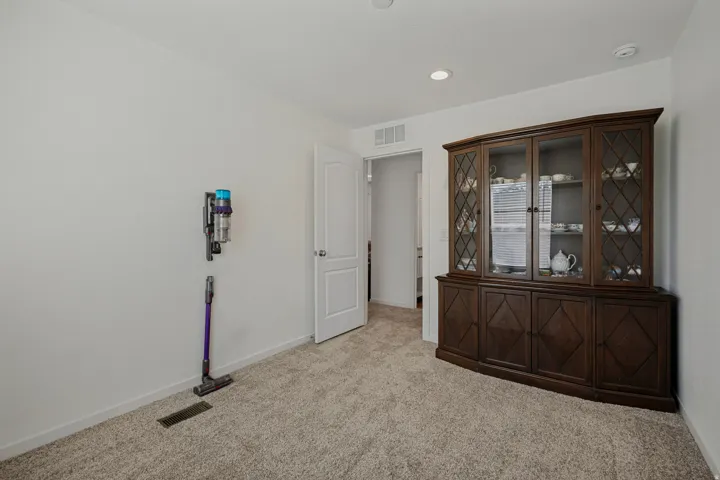 Recessed lighting and neutral wall paint