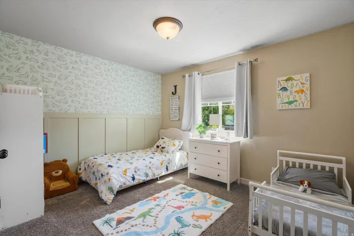Panel accent wall with patterned wallpaper