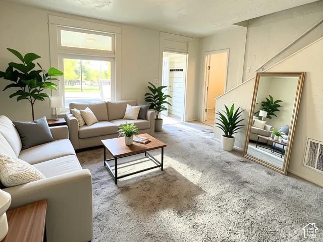 Large front room with lots of light.  neutral colors