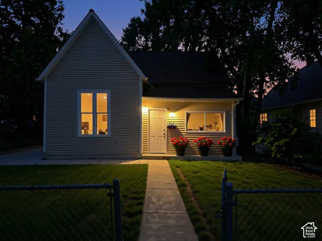 Siding exterior with a gabled roofline, virtually enhanced