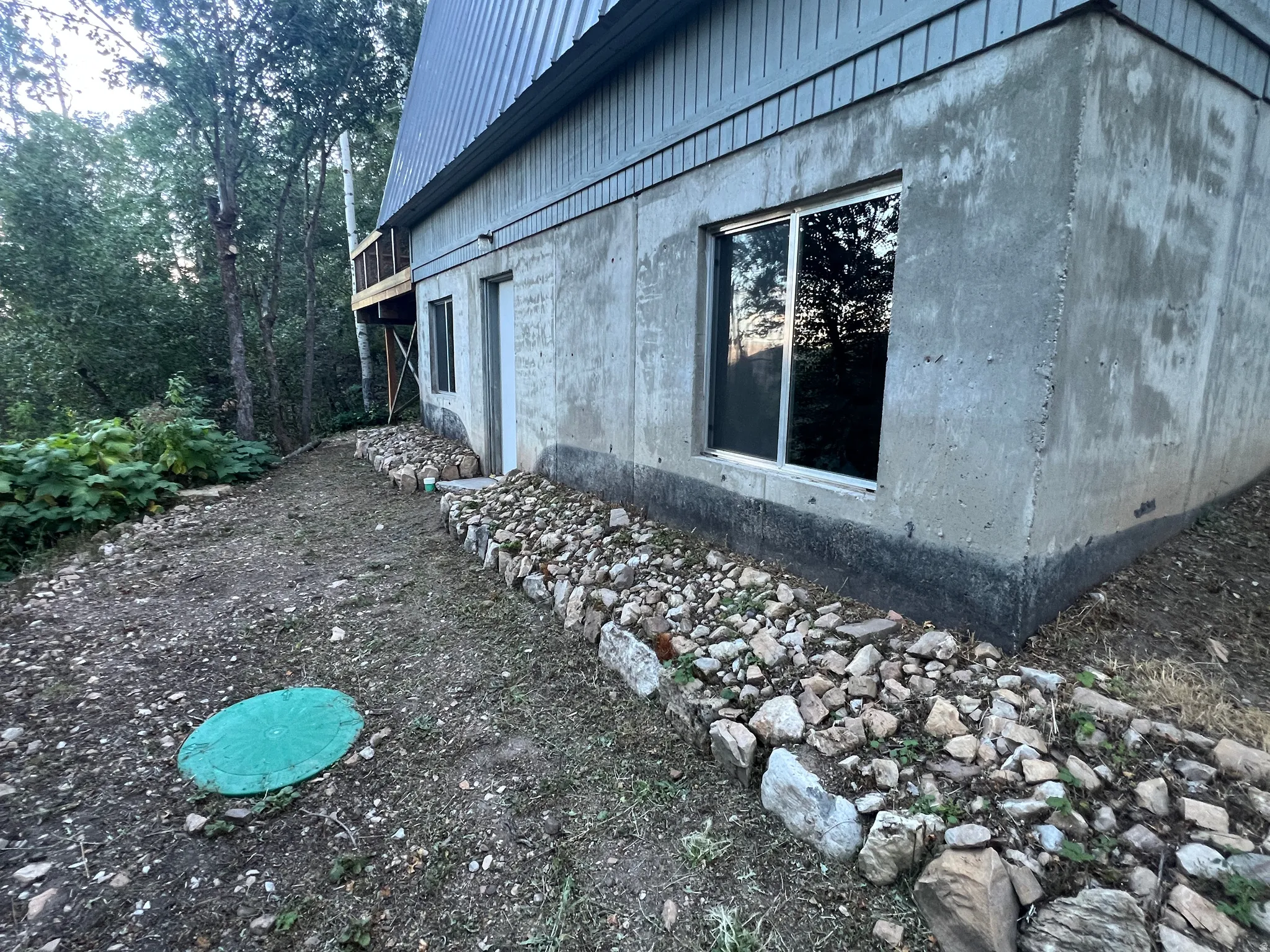 Back side of cabin with septic access