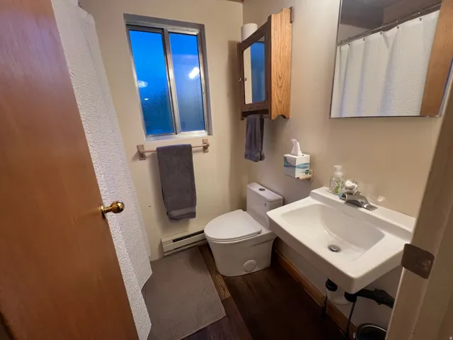 Main floor bath with full tub (just off that beautiful bedroom!