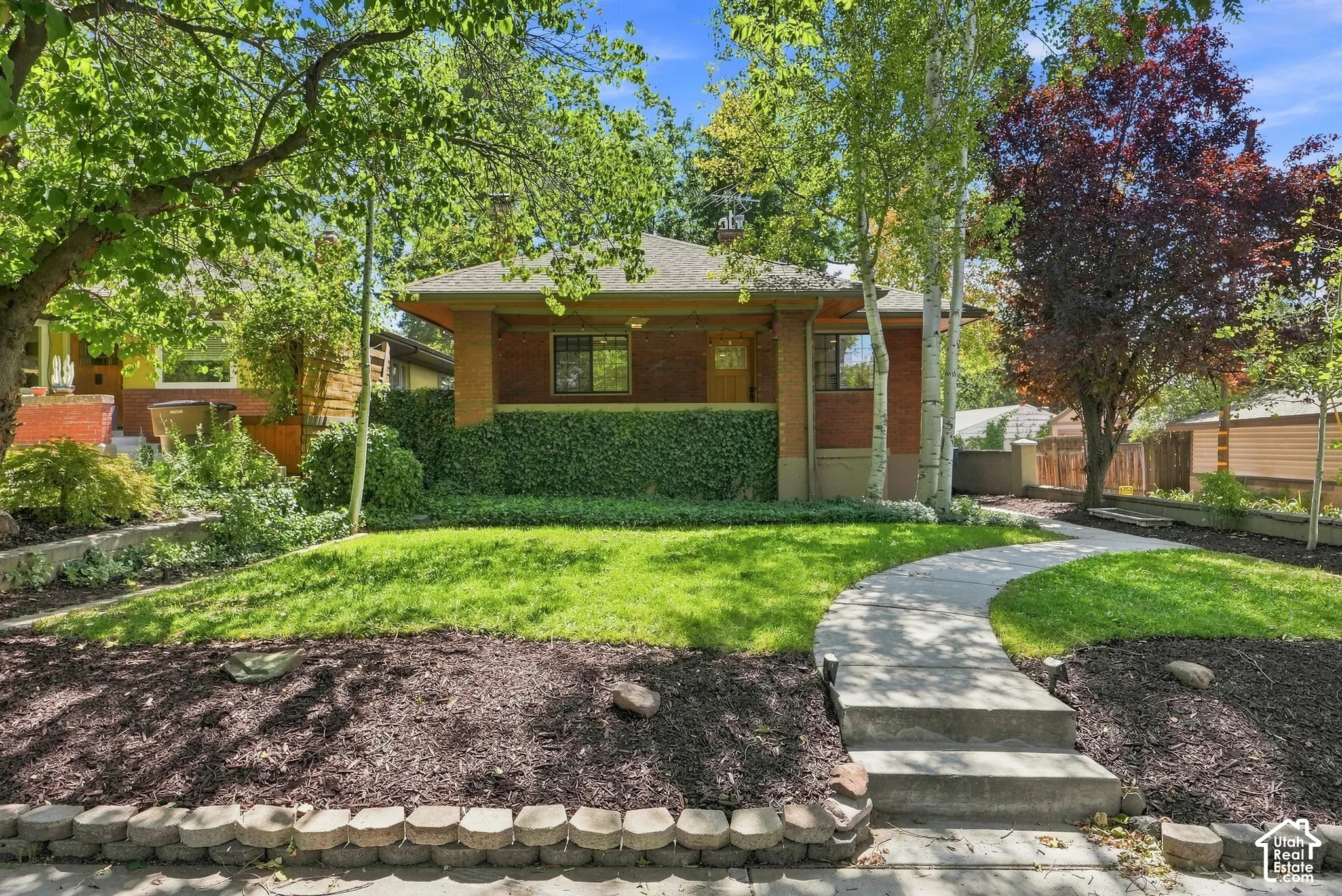 Brick exterior with a covered porch