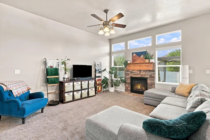 Vaulted ceiling with a ceiling fan