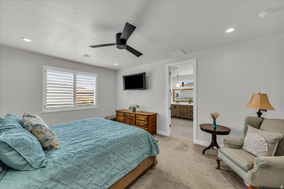 Recessed lighting and ceiling fan overhead
