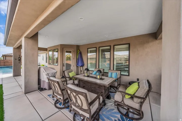 Covered patio featuring a solid ceiling and recessed lighting