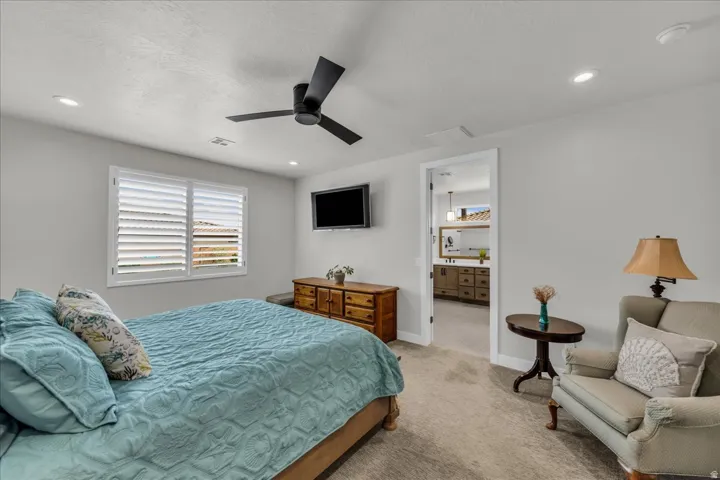 Recessed lighting and ceiling fan overhead