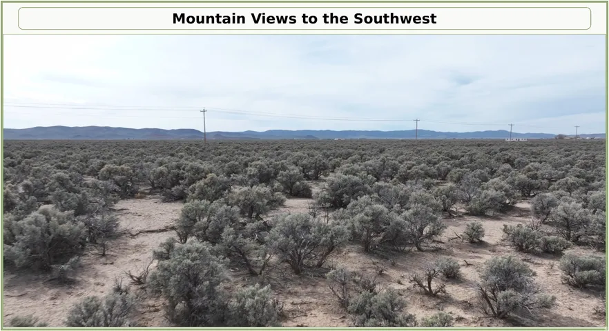 Expansive terrain featuring natural shrubbery and distant mountain ranges