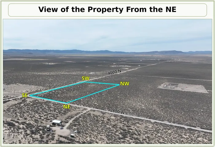 Expansive desert landscape with a clearly delineated property boundary