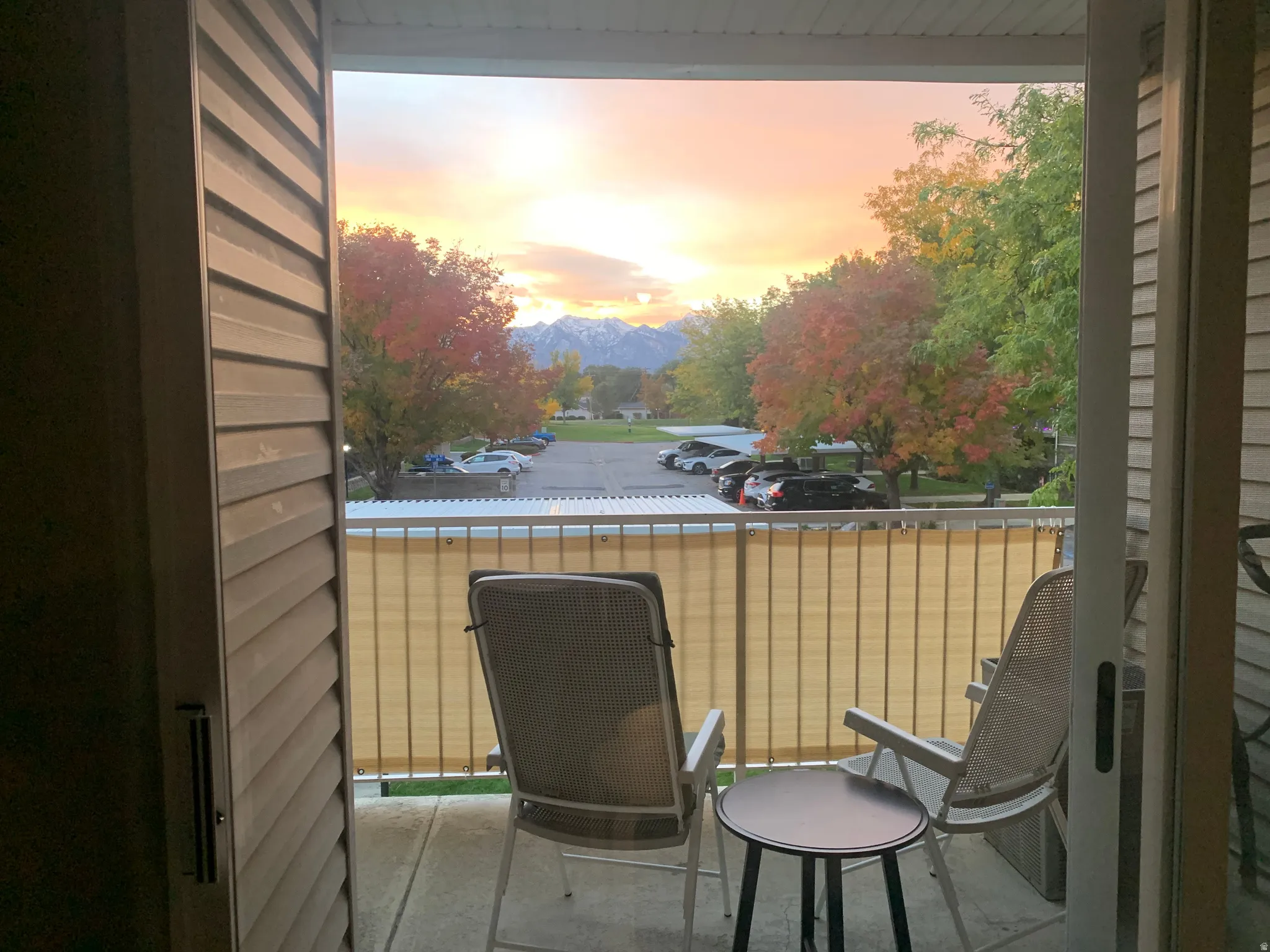 Sliding glass door opening to a private balcony