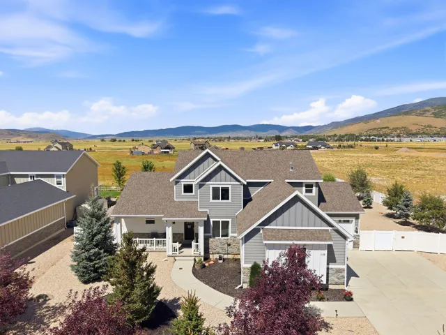 Modern gray siding exterior with stone accents