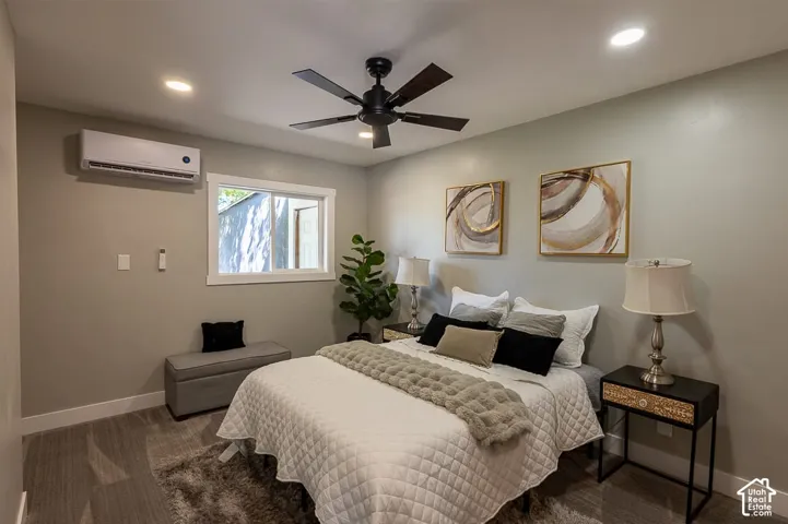 Recessed lighting, ceiling fan, hard-surface flooring, and a window
