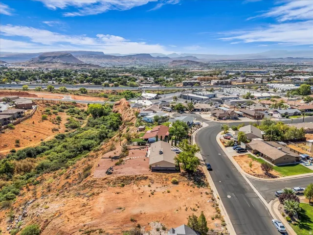 Sweeping mountain backdrop with a residential neighborhood
