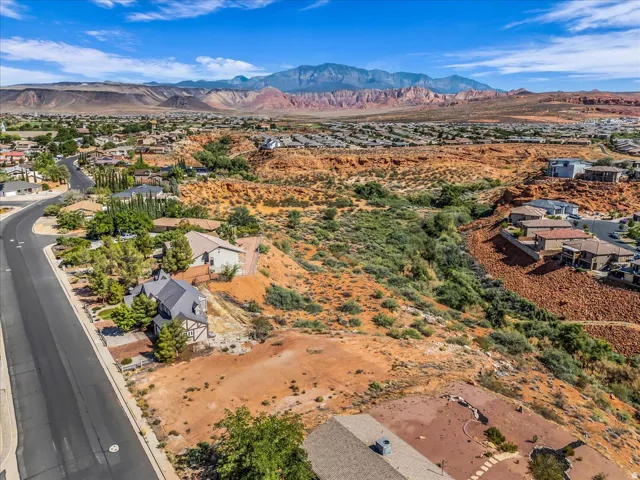 Elevated neighborhood setting with distant mountain ranges and desert landscaping