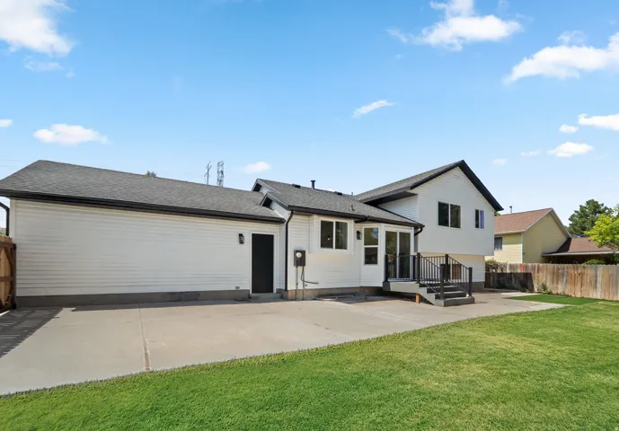 Expansive concrete patio with direct outdoor access