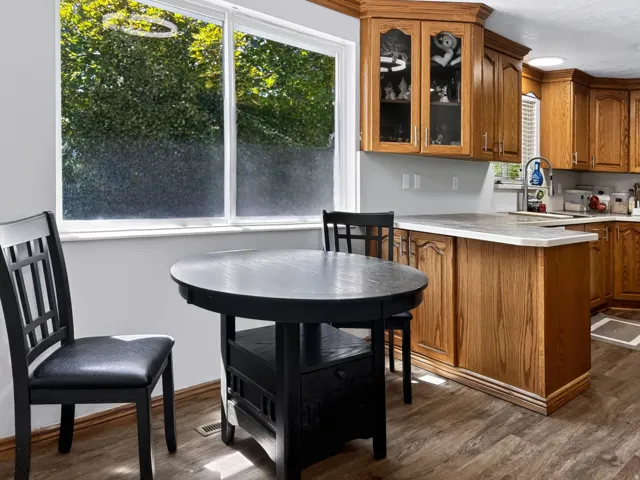 Wood-finish flooring with perimeter baseboard