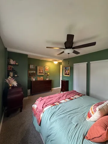 Ceiling fan with integrated lighting, recessed lighting, wall-to-wall carpeting, and sliding closet doors