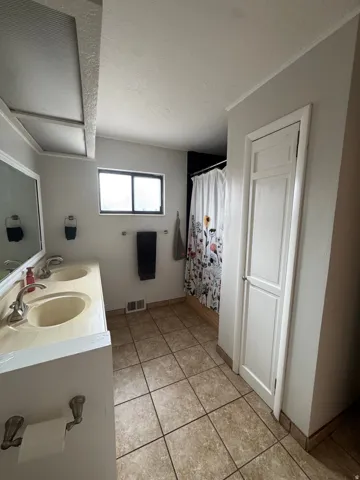 Dual vanity with chrome fixtures