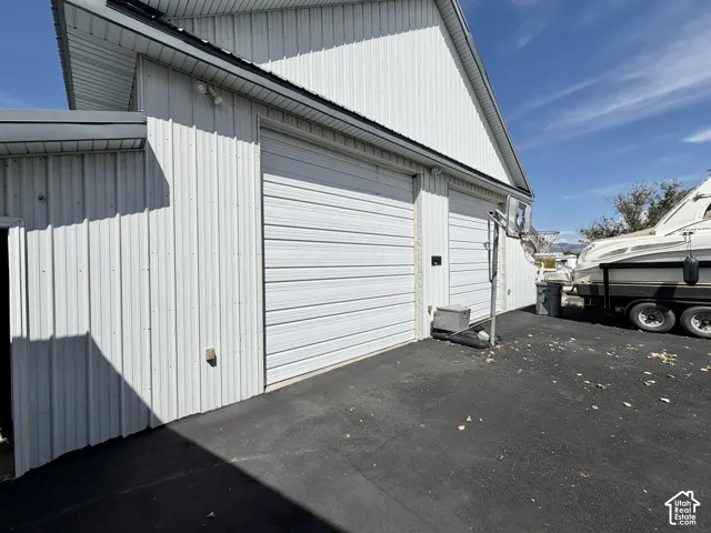 Attached garage with two overhead doors