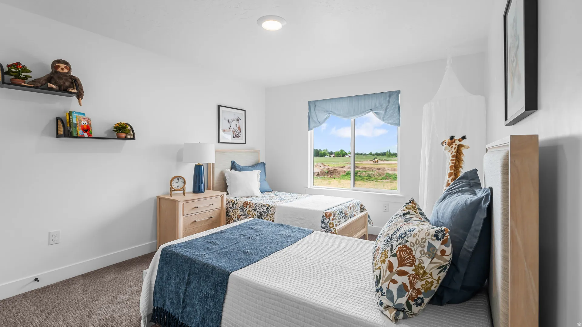 Recessed ceiling lighting, wall-mounted shelving, wood-finish nightstand with drawer storage, and a large window