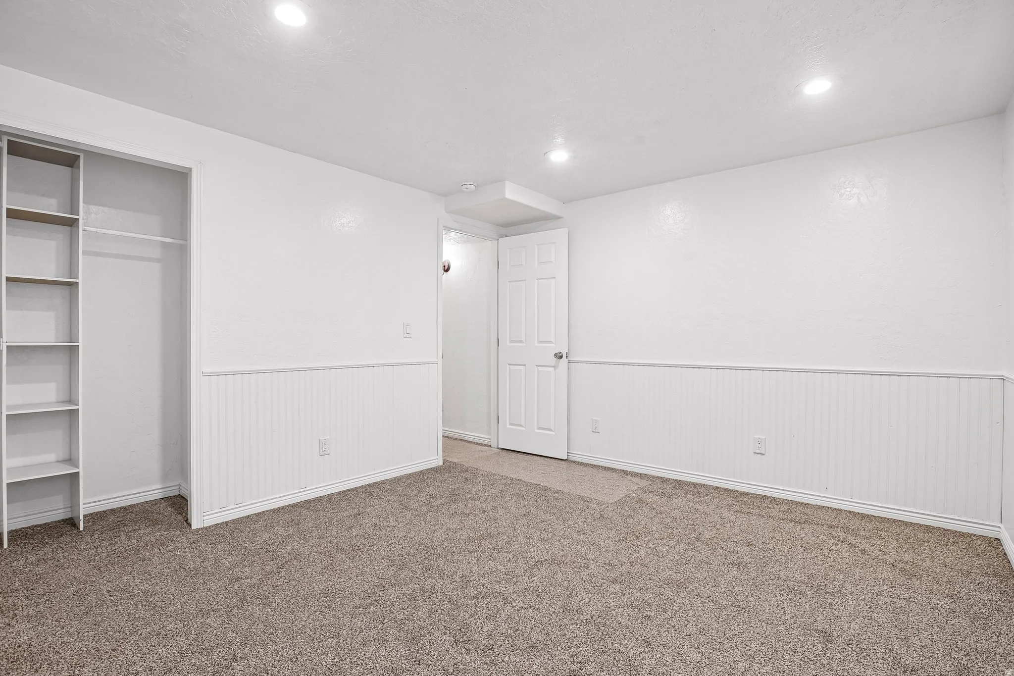Recessed lighting and beadboard wainscoting