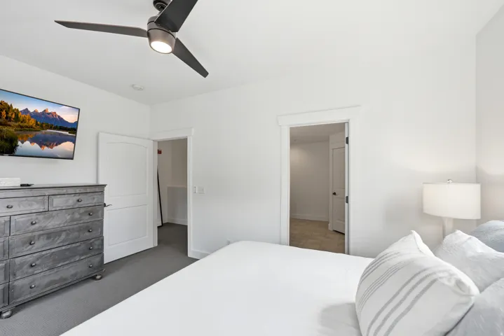 Recessed lighting, ceiling fan with integrated light, carpeted flooring, and white interior doors