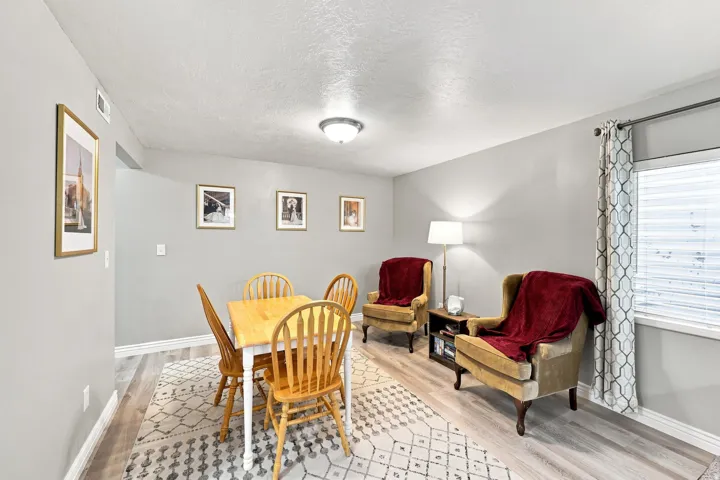 Light-toned wall finishes, recessed lighting, and wood-finish flooring