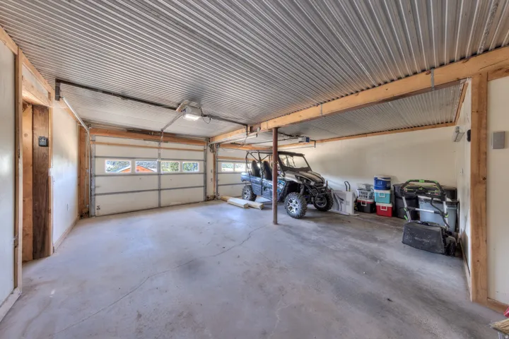 Two car garage with space for storage.