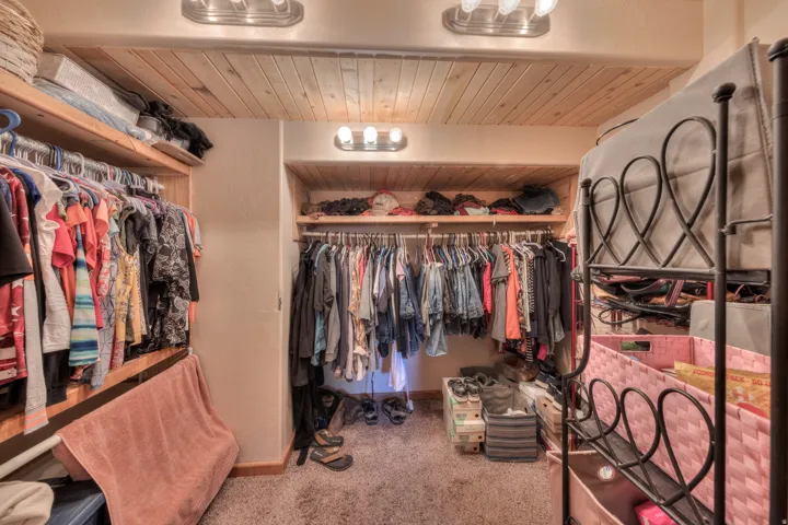 Primary bedroom walk-in closet.