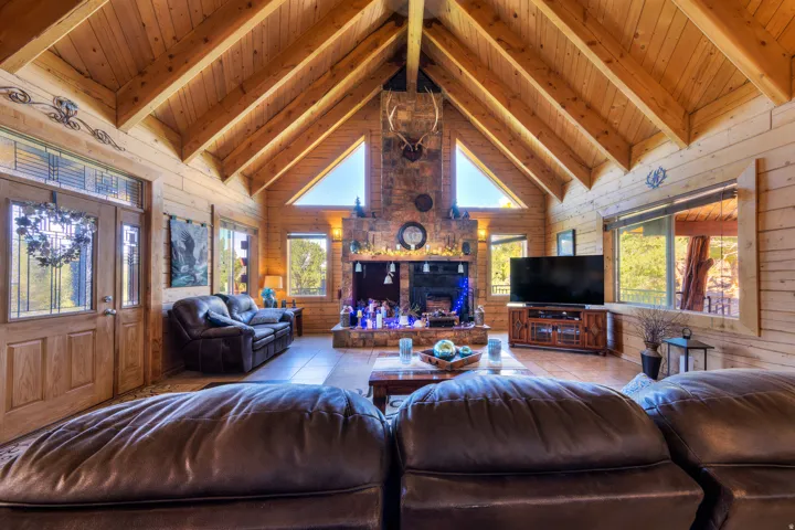 Great room with stone fireplace.