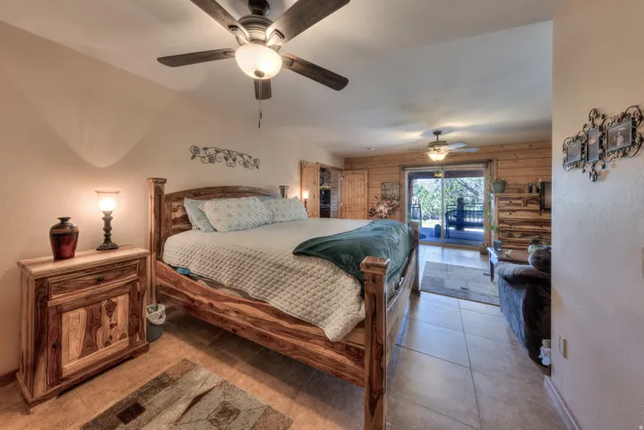 Main floor bedroom with walk out to patio.