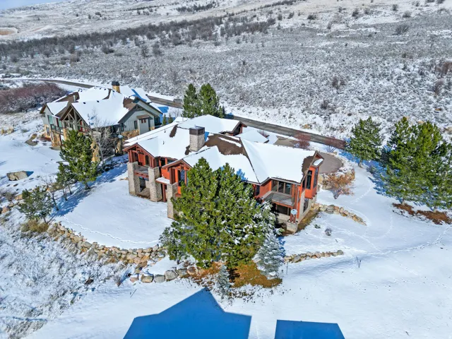 Striking architectural residence set on expansive grounds with mature evergreen landscaping